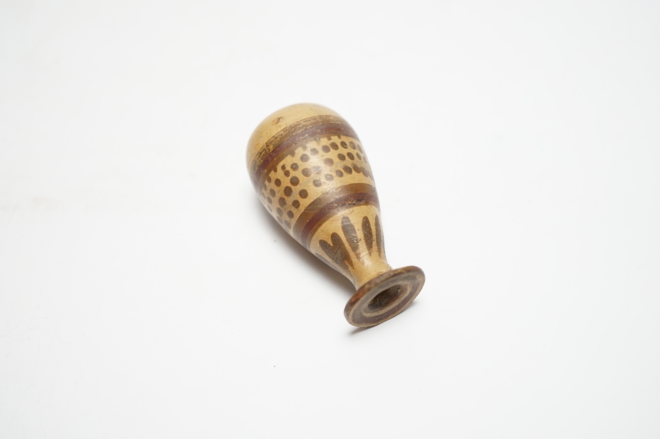 A Greek Corinthian pottery alabastron, c.5th century BC, 6.5cm